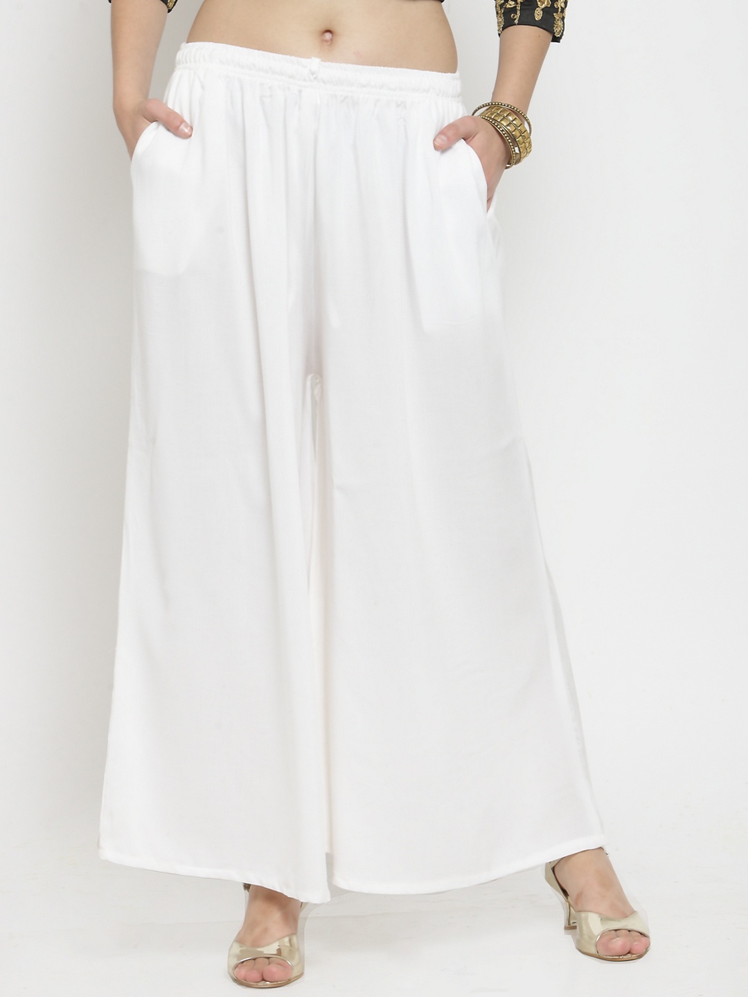 

Clora Creation Women Off-White Solid Flared Palazzos