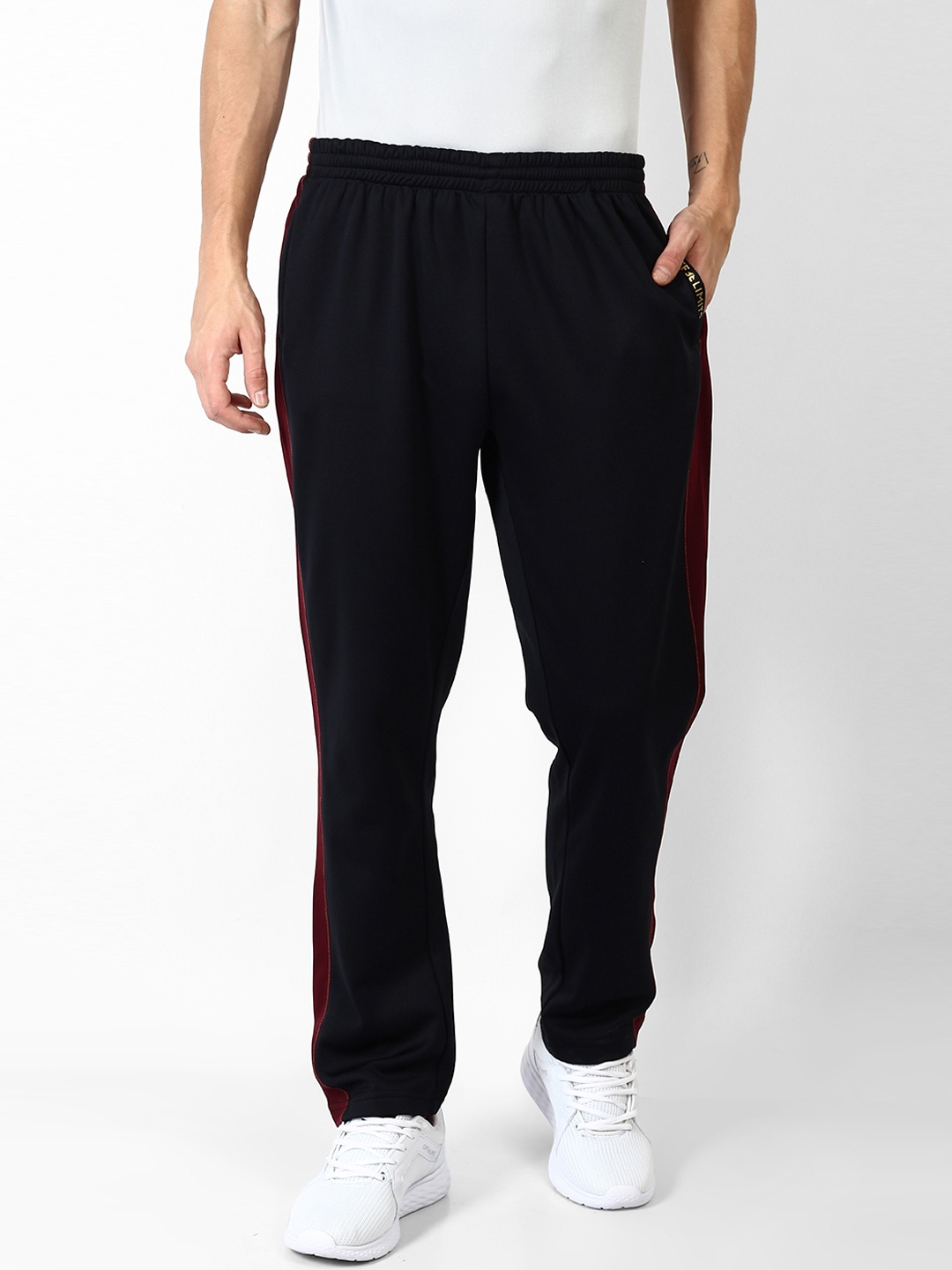 

OFF LIMITS Men Black Solid Straight-Fit Trackpants
