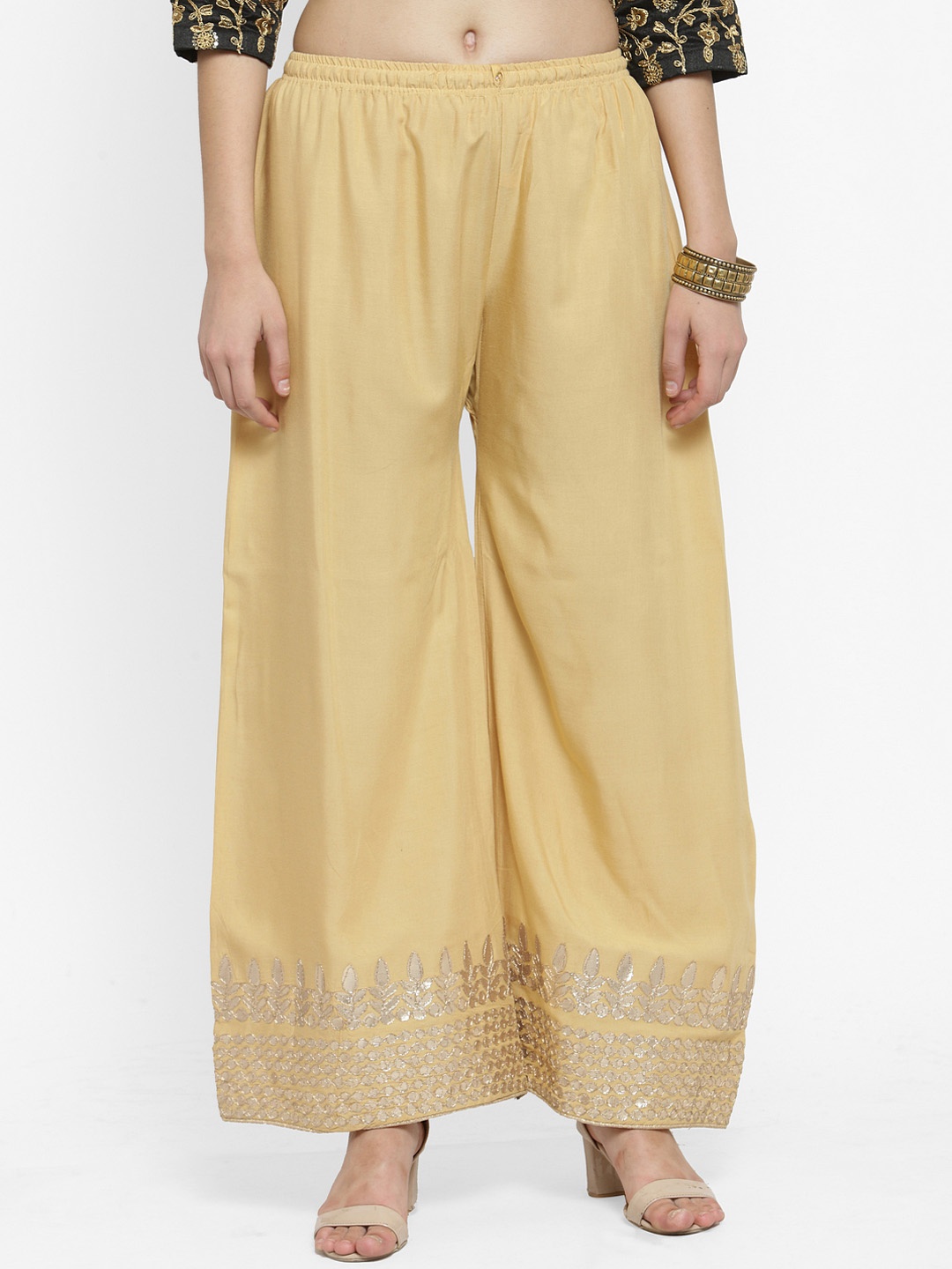 

Clora Creation Women Beige Straight Solid Palazzos