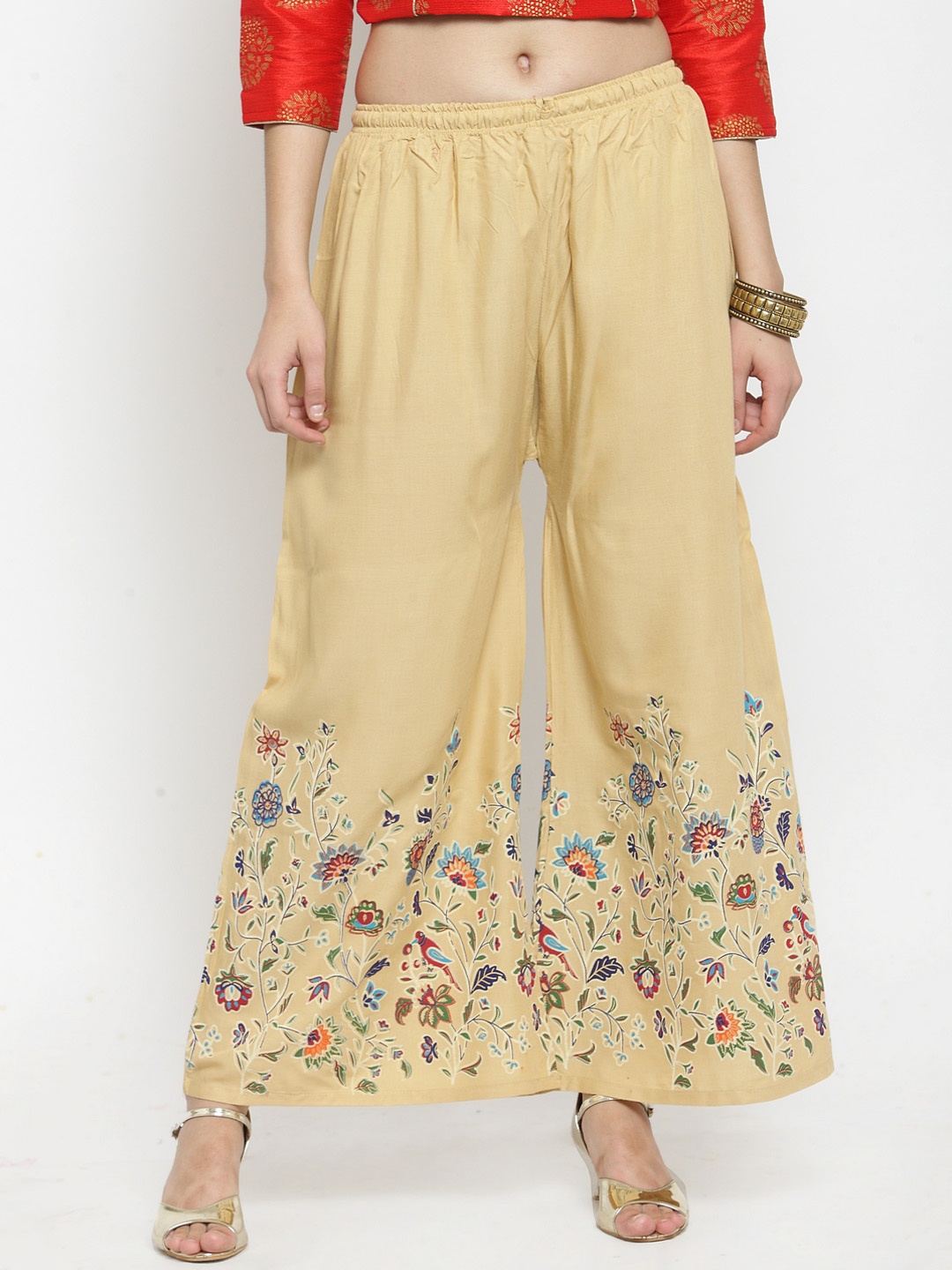 

Clora Creation Women Beige Flared Printed Palazzos