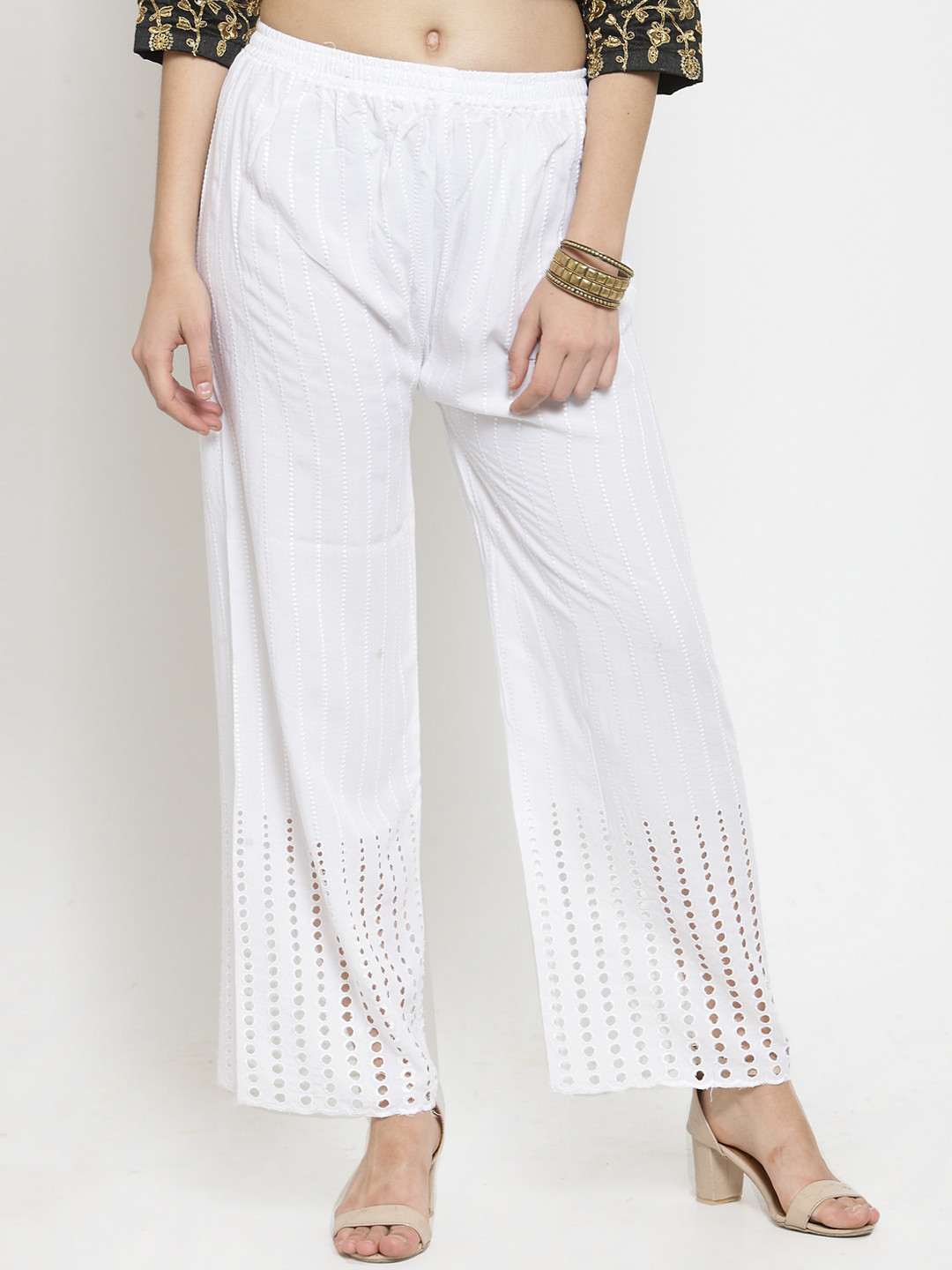 

Clora Creation Women White Solid Straight Palazzos