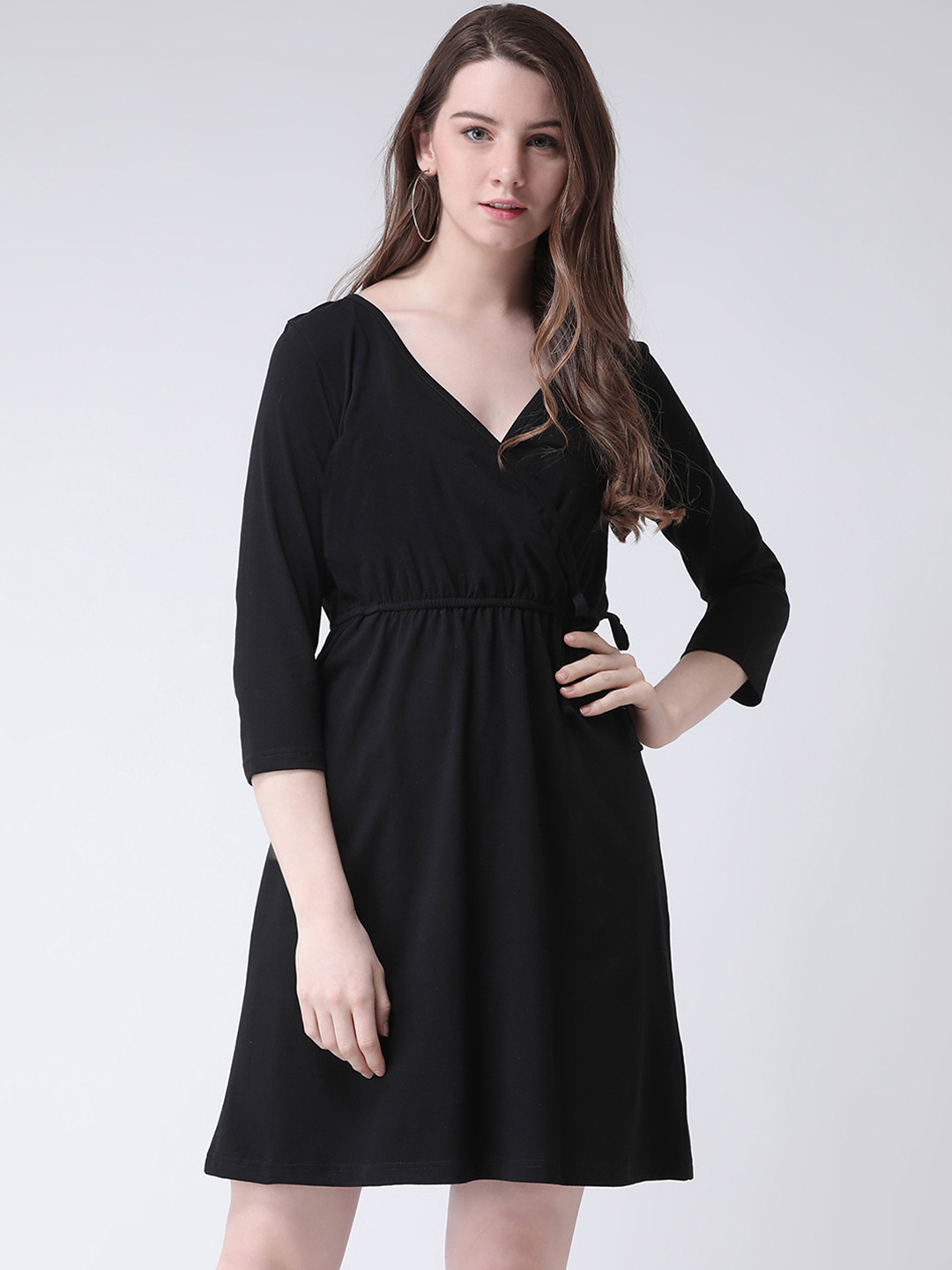 

The Vanca Women Black Solid Wrap Dress
