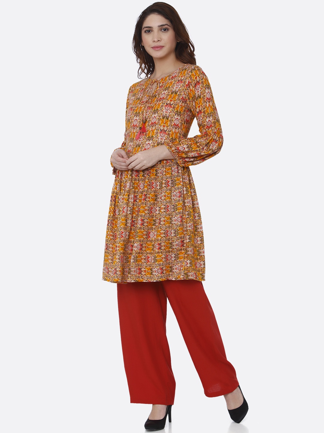 

Shiloh Women Yellow Printed A-Line Kurti
