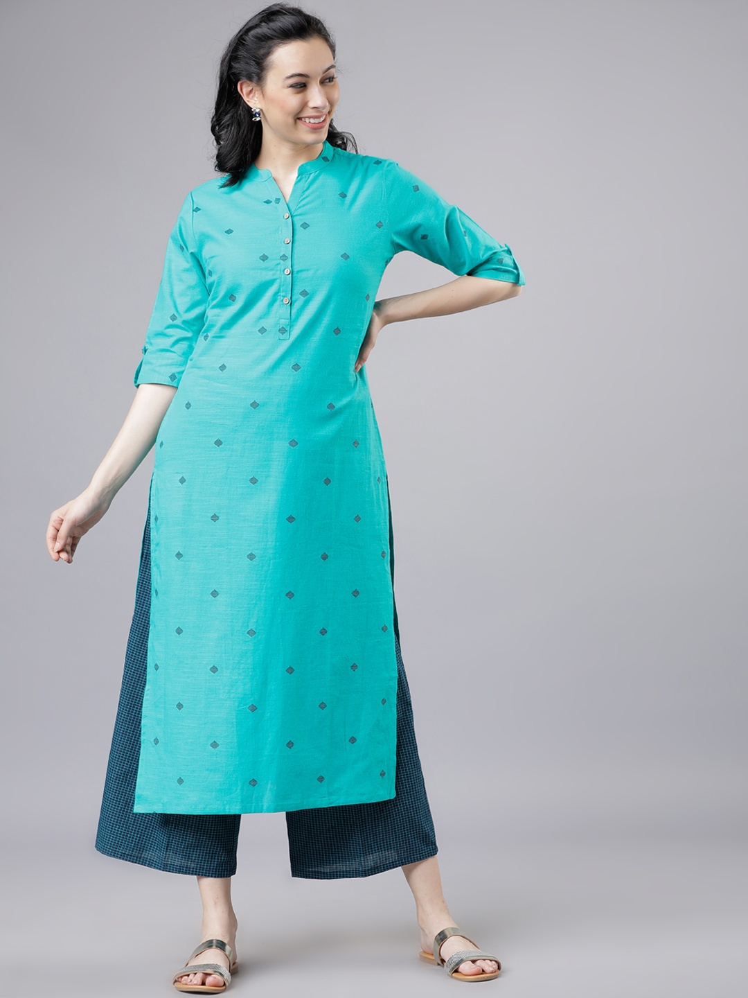 

Vishudh Women Turquoise Blue & Navy Blue Printed Kurta with Palazzos
