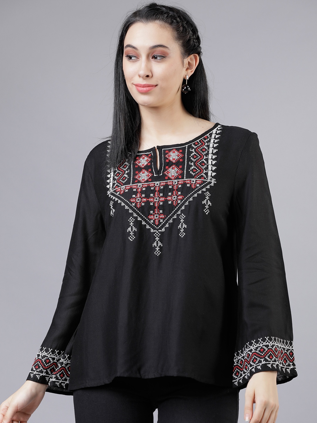 

Vishudh Women Black Embroidered A-Line Top
