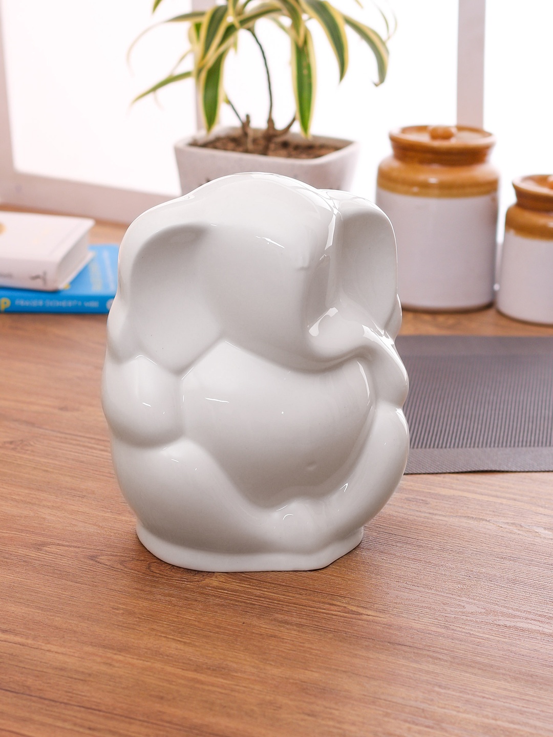 

Clay Craft White Ganesha Showpiece