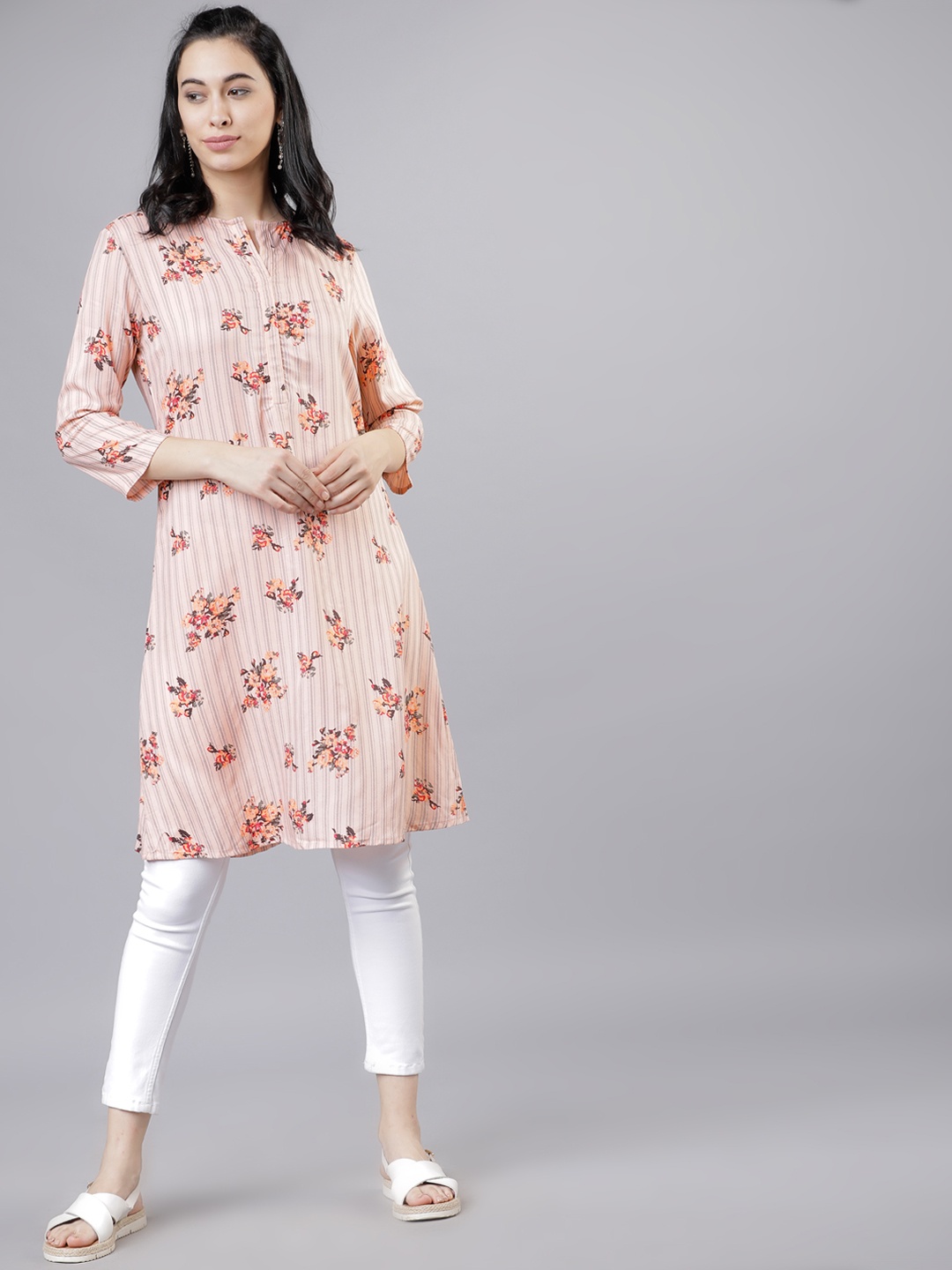 

Vishudh Peach-Coloured Floral Print Tunic