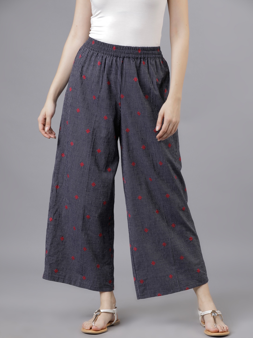 

Vishudh Women Navy Blue & Red Solid Palazzos
