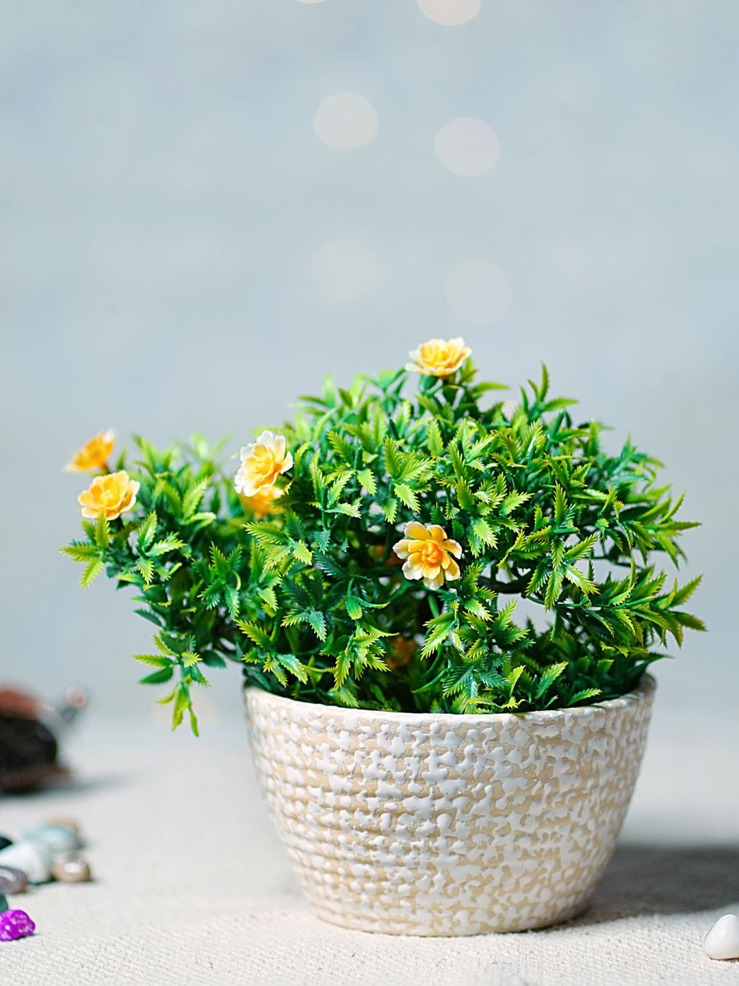 

Unravel India Yellow & White Printed Ceramic Oval Table Top Planter