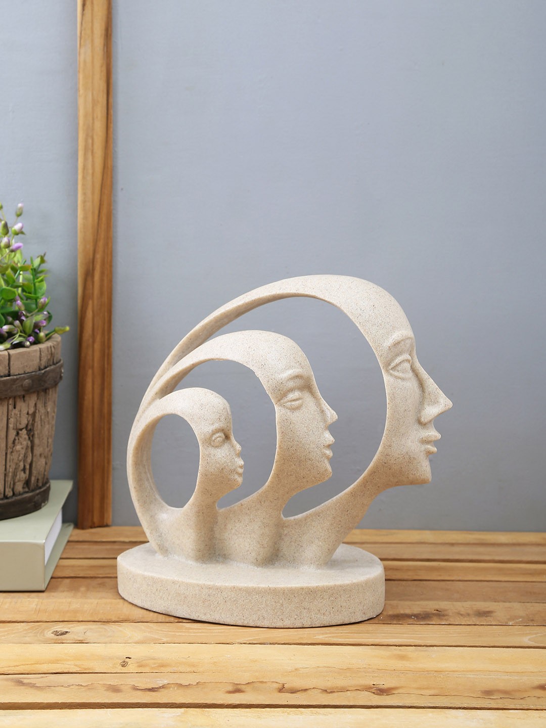 

TAYHAA White Sand Stone Face Statue