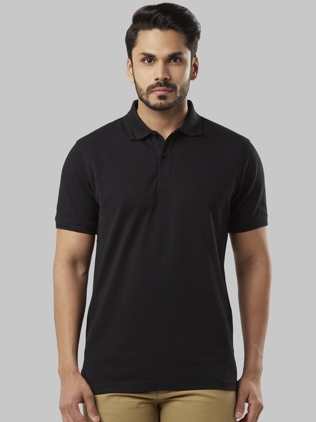 

Raymond Men Black Solid Polo Collar T-shirt