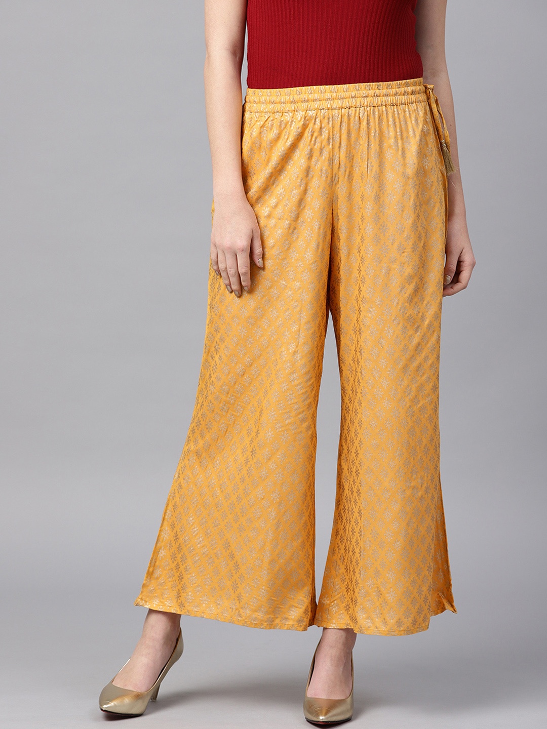 

Varanga Women Yellow Printed Palazzos