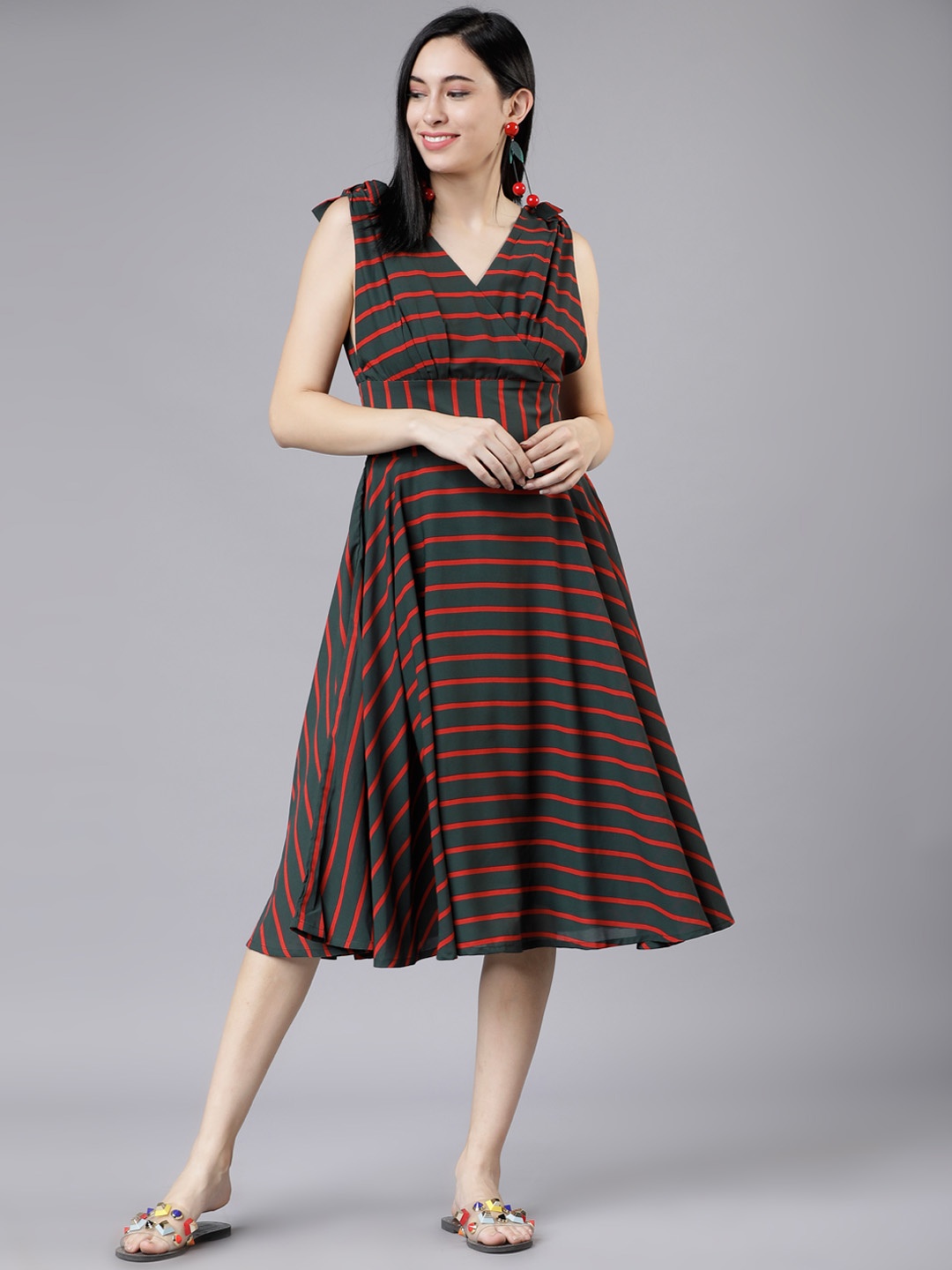 

Tokyo Talkies Women Green Striped Empire Dress