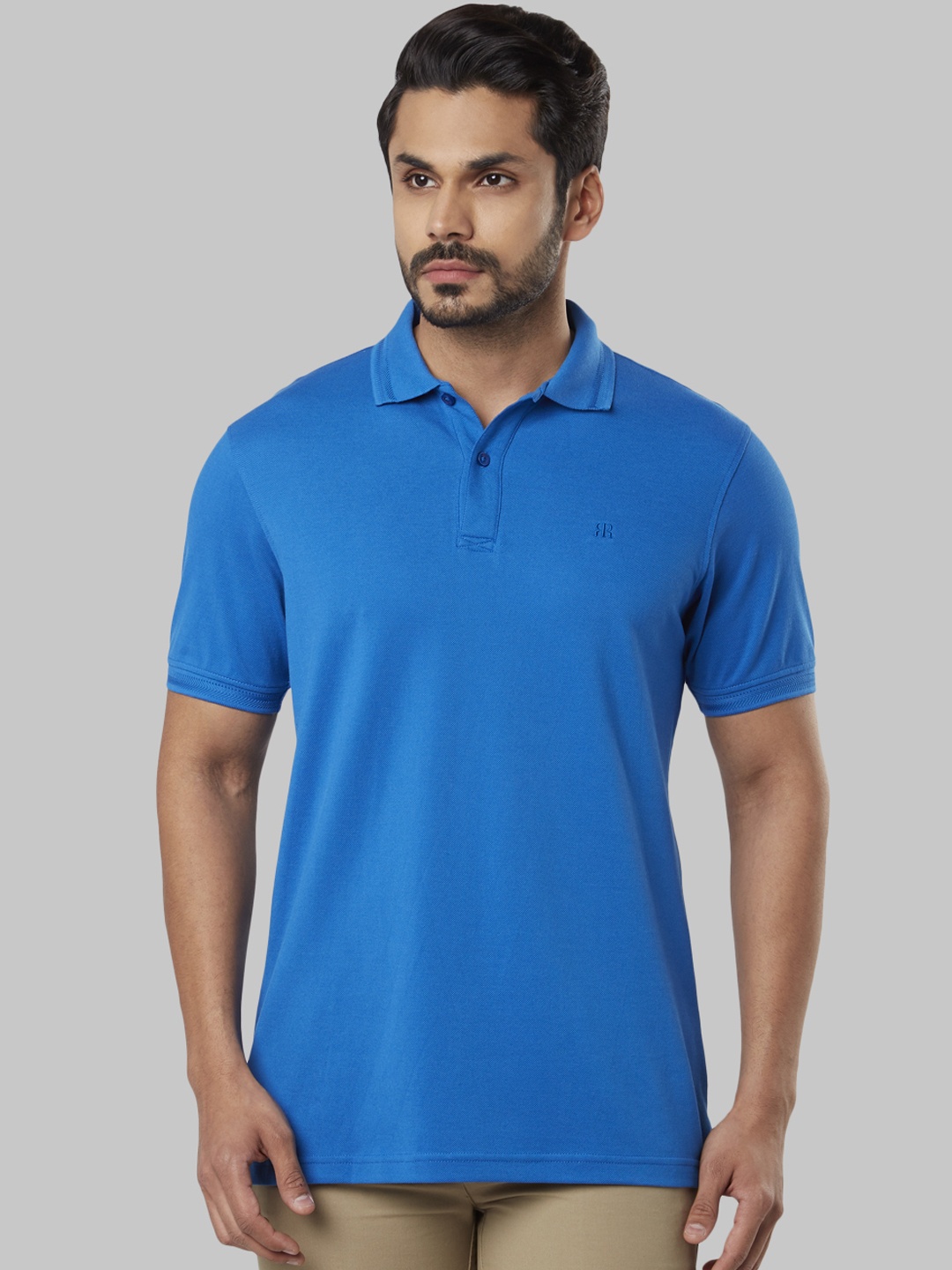

Raymond Men Blue Solid Polo Collar T-shirt