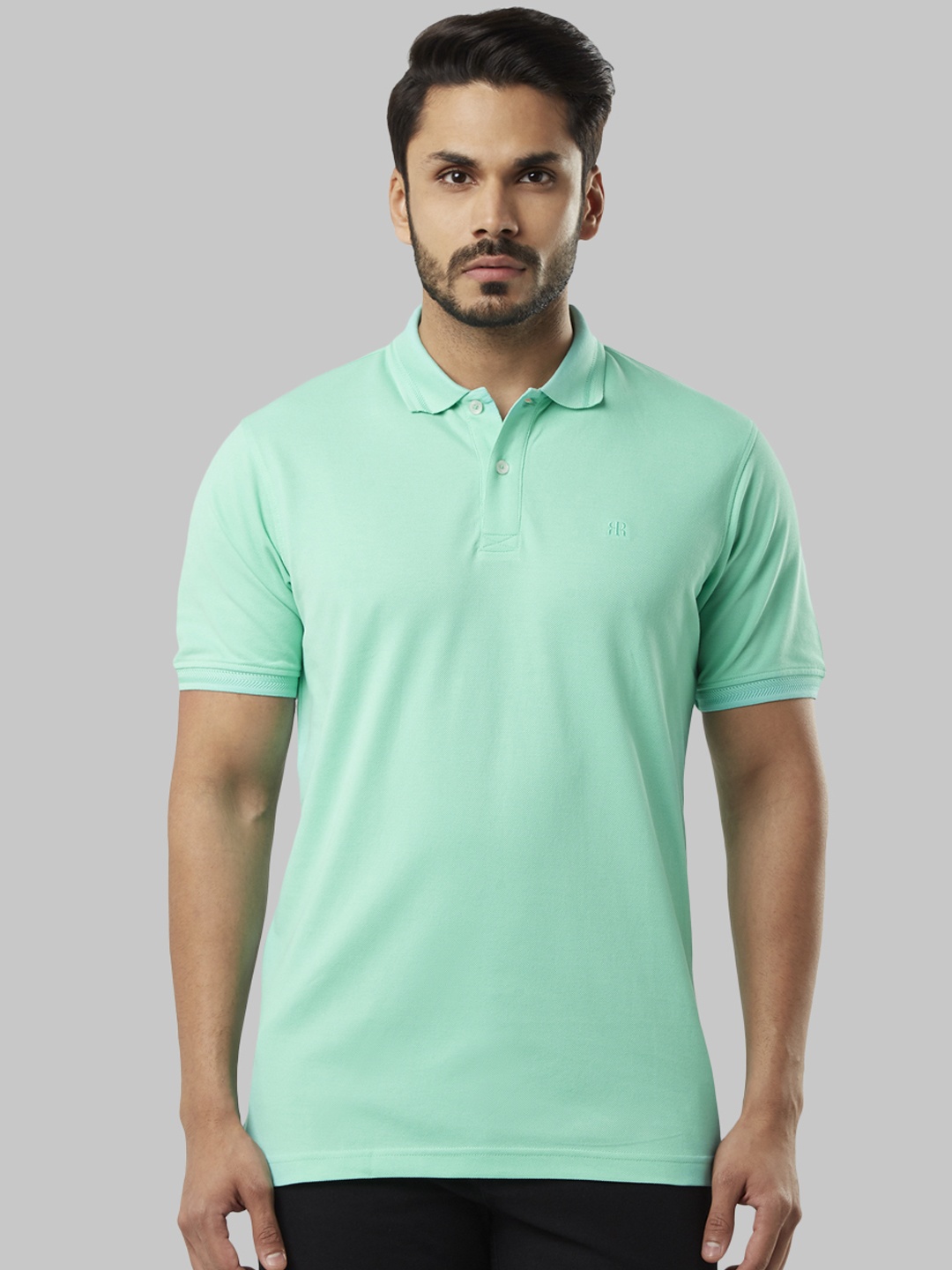 

Raymond Men Green Solid Polo Collar T-shirt