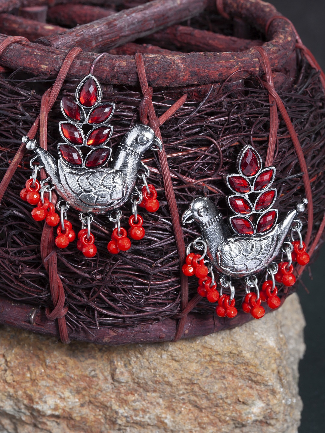 

Moedbuille Silver-Plated & Red Oxidised Peacock Shaped Drop Earrings