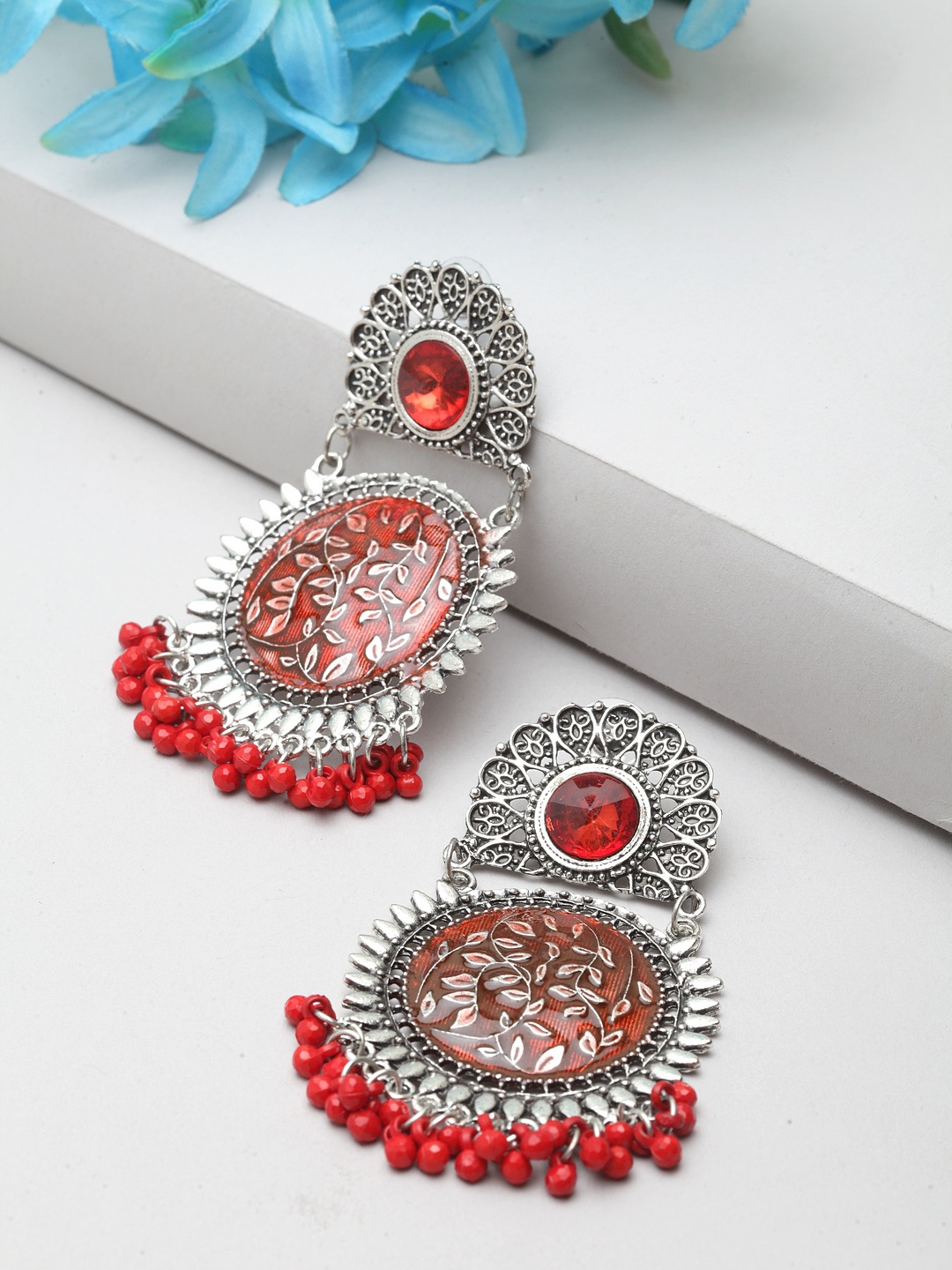 

Moedbuille Women Red & Silver-Plated Circular Drop Earrings