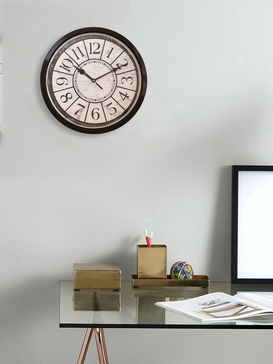 

eCraftIndia Beige Round Solid Analogue Wall Clock