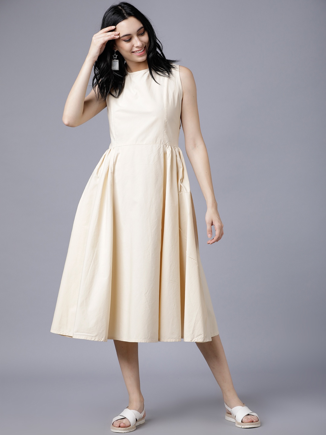 

Tokyo Talkies Women Beige Solid Fit and Flare Dress