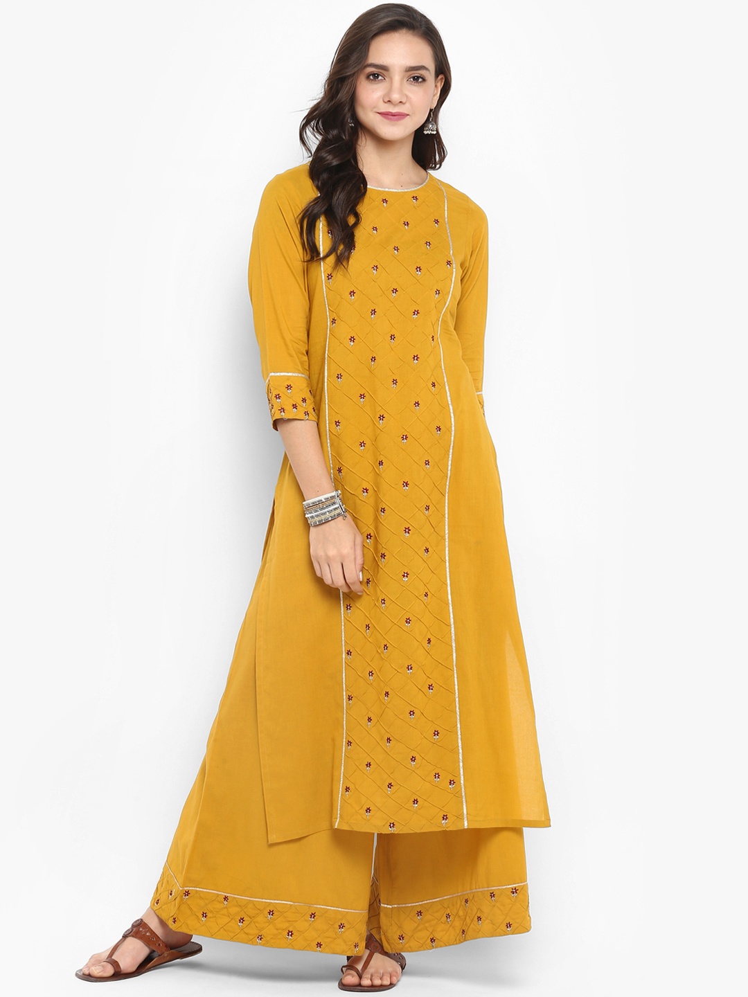 

Janasya Women Mustard Yellow Cotton Kurta With Palazzo
