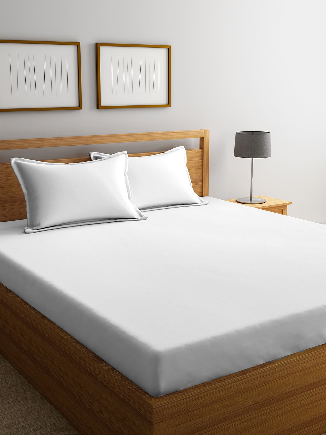 

BOMBAY DYEING White Solid 120 TC Cotton Queen Bedsheet with 2 Pillow Covers