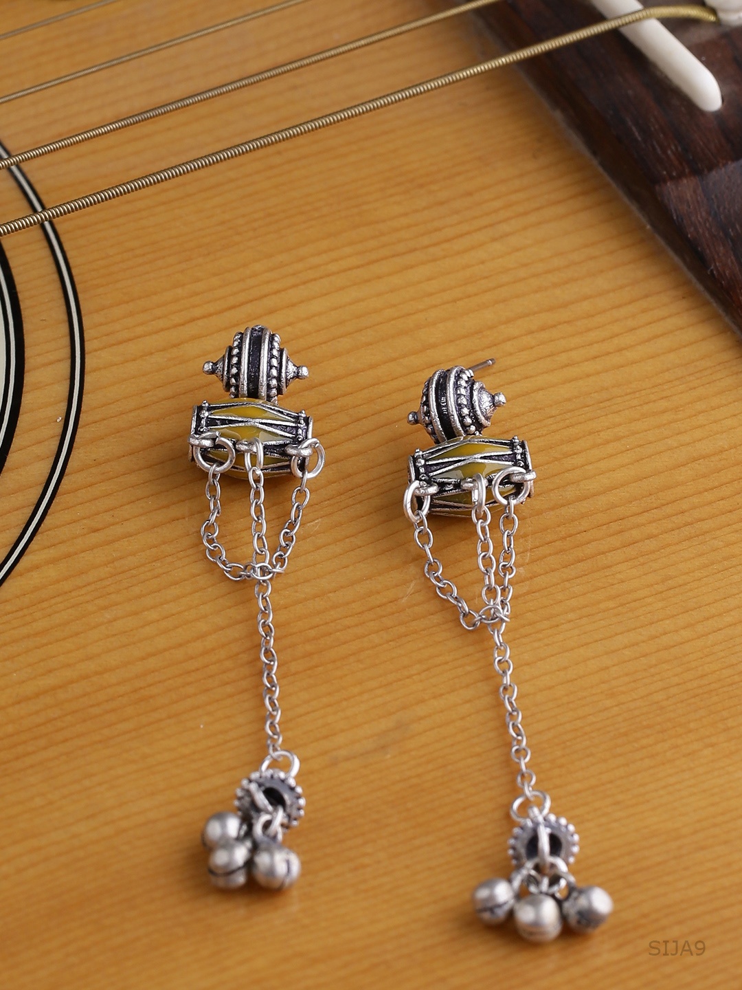

Voylla Silver-Toned Silver-Plated Contemporary Drop Earrings