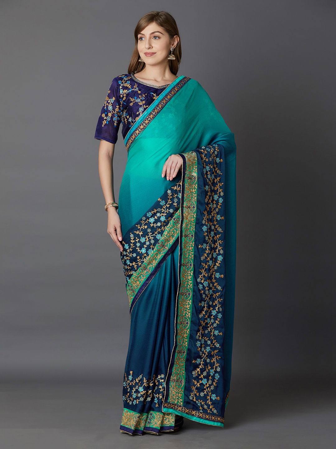 

Mitera Sea Green & Navy Blue Poly Georgette Embroidered Saree