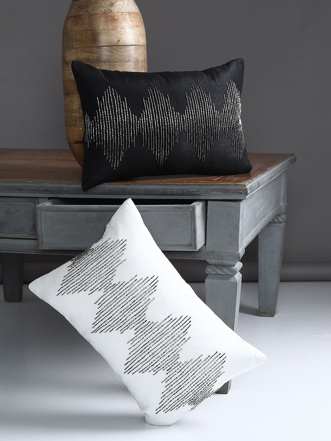 

Alina decor Black & White Set of 2 Self Design Rectangle Cushion Covers