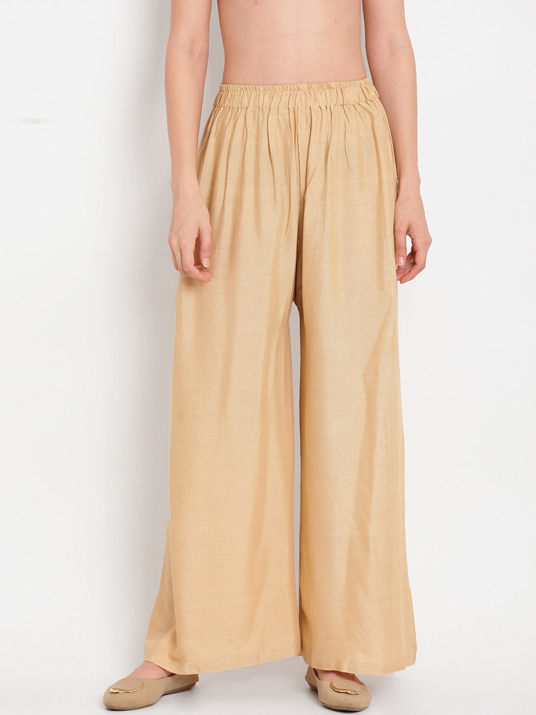 

TAG 7 Women Beige Solid Flared Palazzos