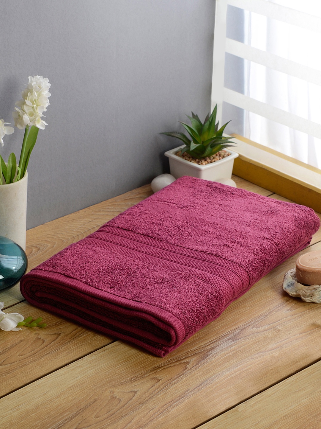 

Softweave Men Purple Self Design 525 GSM Bath Towel
