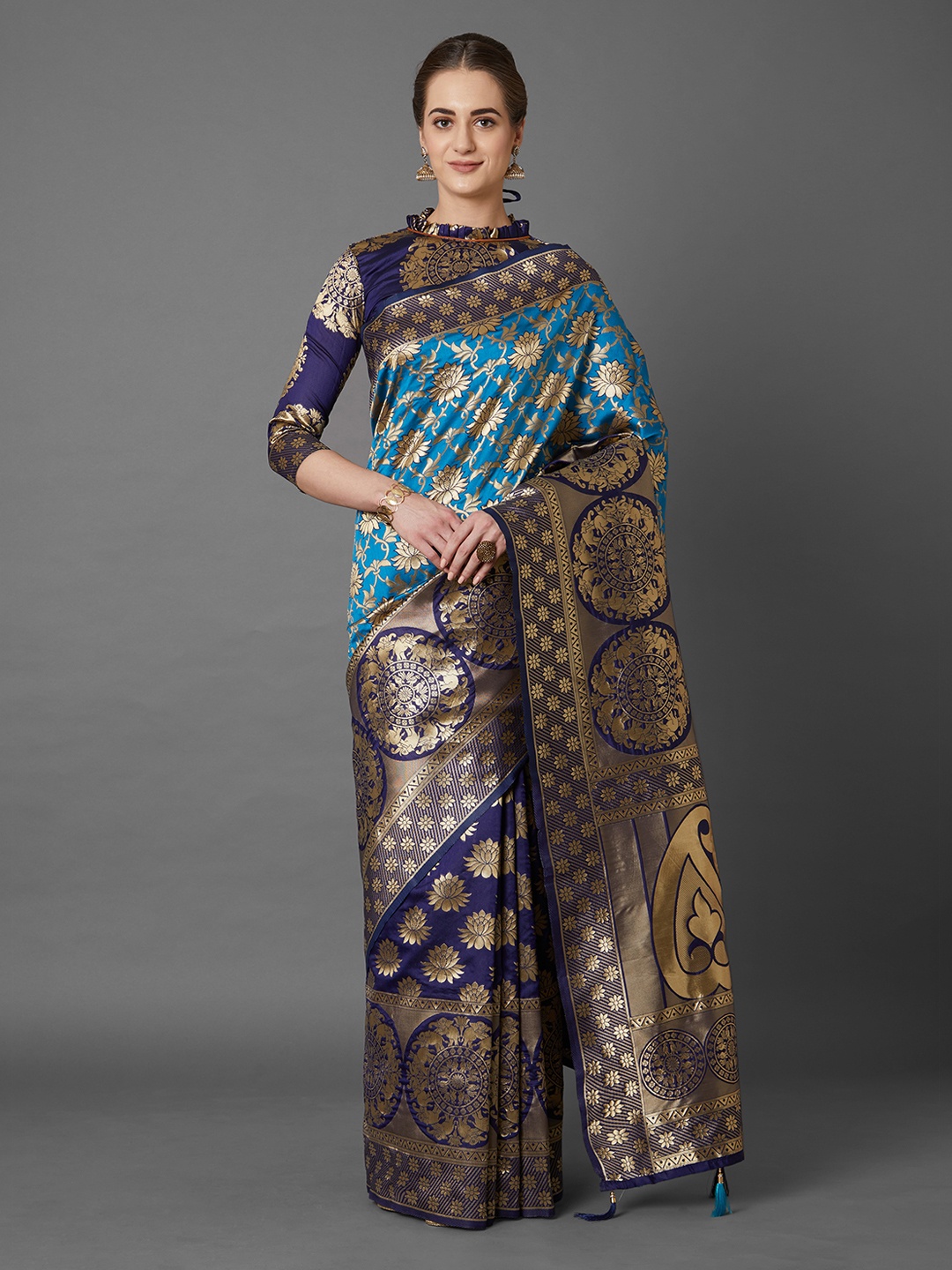 

Mitera Turquoise Blue Silk Blend Woven Design Kanjeevaram Saree