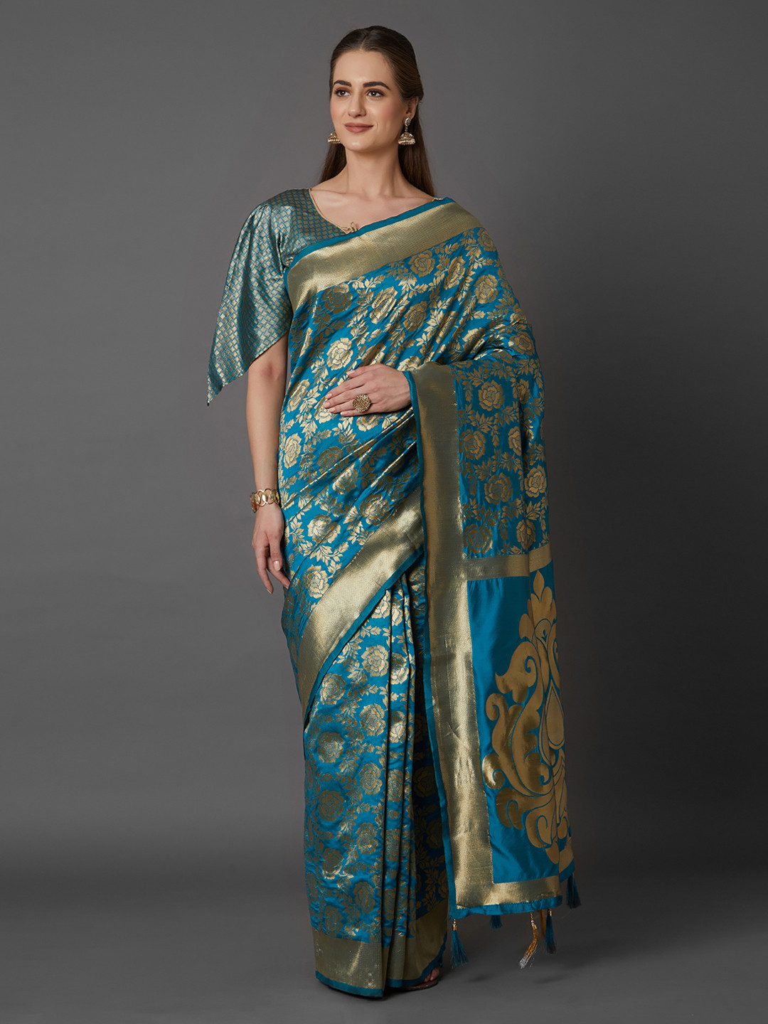 

Mitera Turquoise Blue Silk Blend Woven Design Kanjeevaram Saree