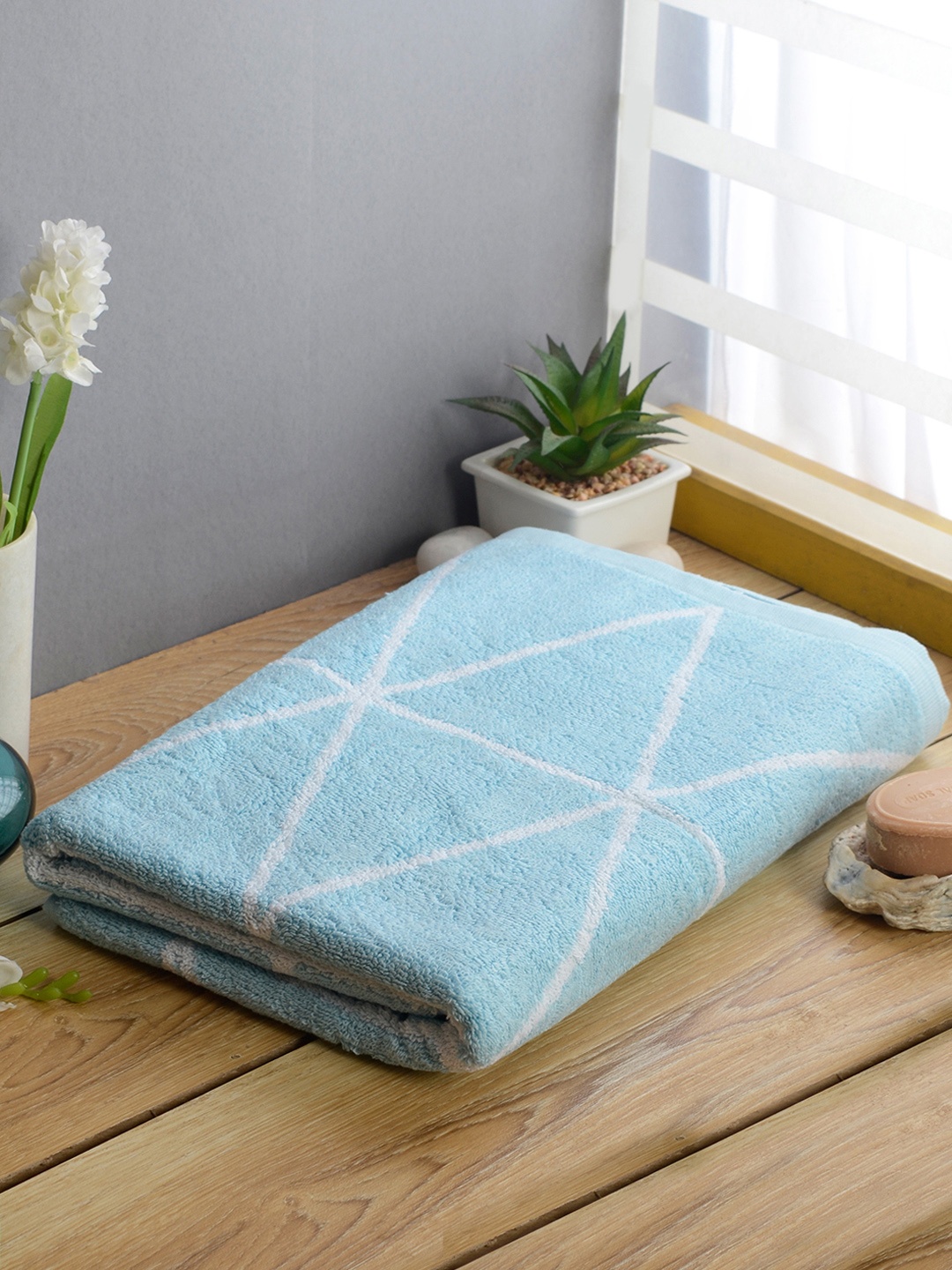 

Softweave Men Blue Printed 500 GSM Bath Towel