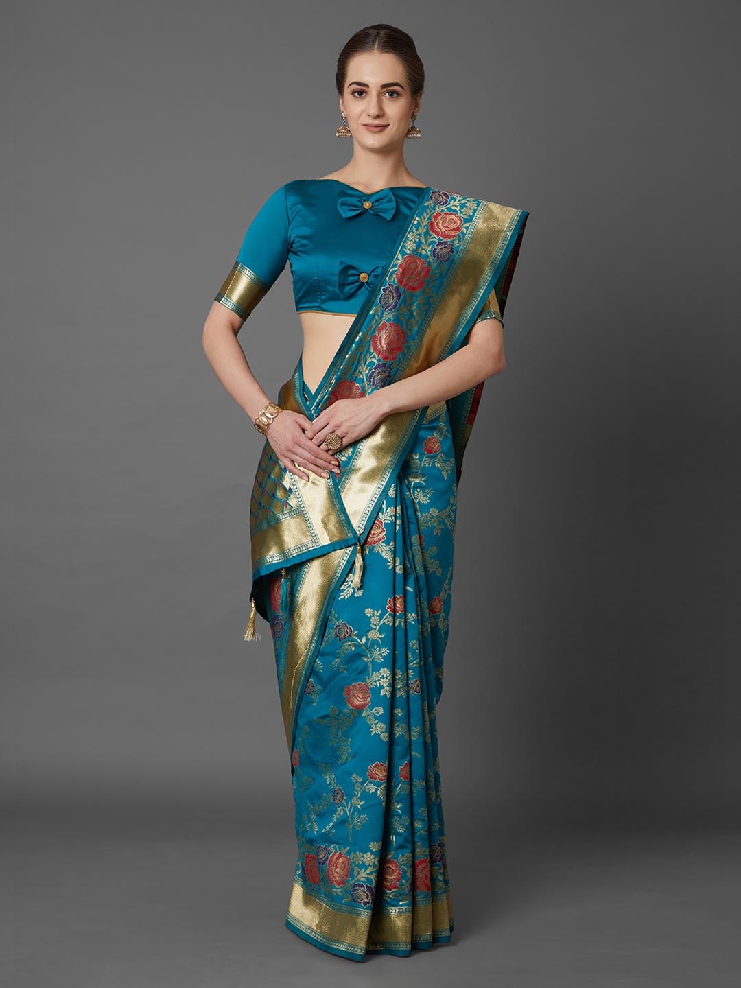 

Mitera Turquoise Blue Silk Blend Woven Design Kanjeevaram Saree