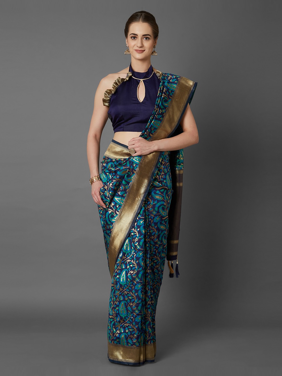 

Mitera Turquoise Blue Silk Blend Woven Design Kanjeevaram Saree