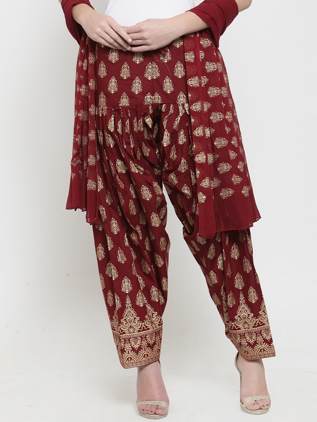 

Clora Creation Women Maroon & Gold-Coloured Foil Print Salwar & Dupatta Set