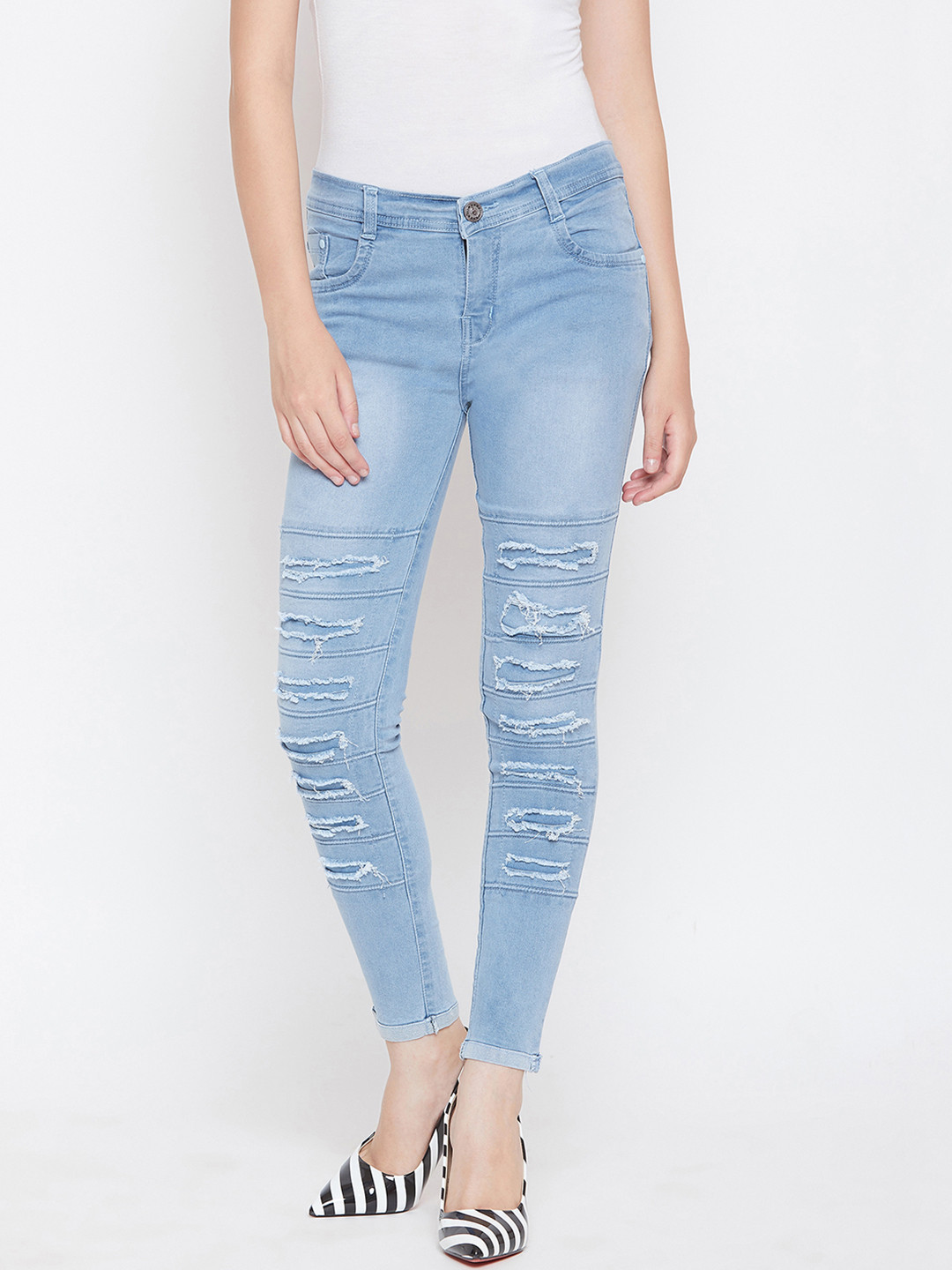 

Nifty Women Blue Slim Fit Mid-Rise Highly Distressed Stretchable Jeans