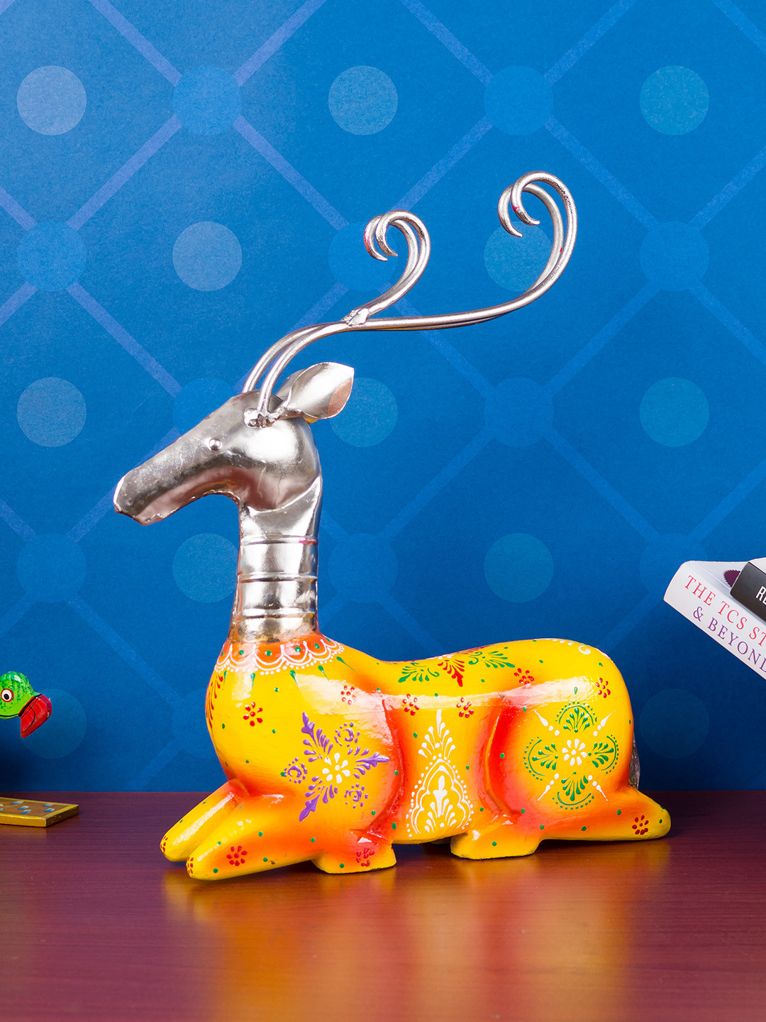 

Golden Peacock Multicoloured Handcrafted Sitting Deer Showpiece, Multi
