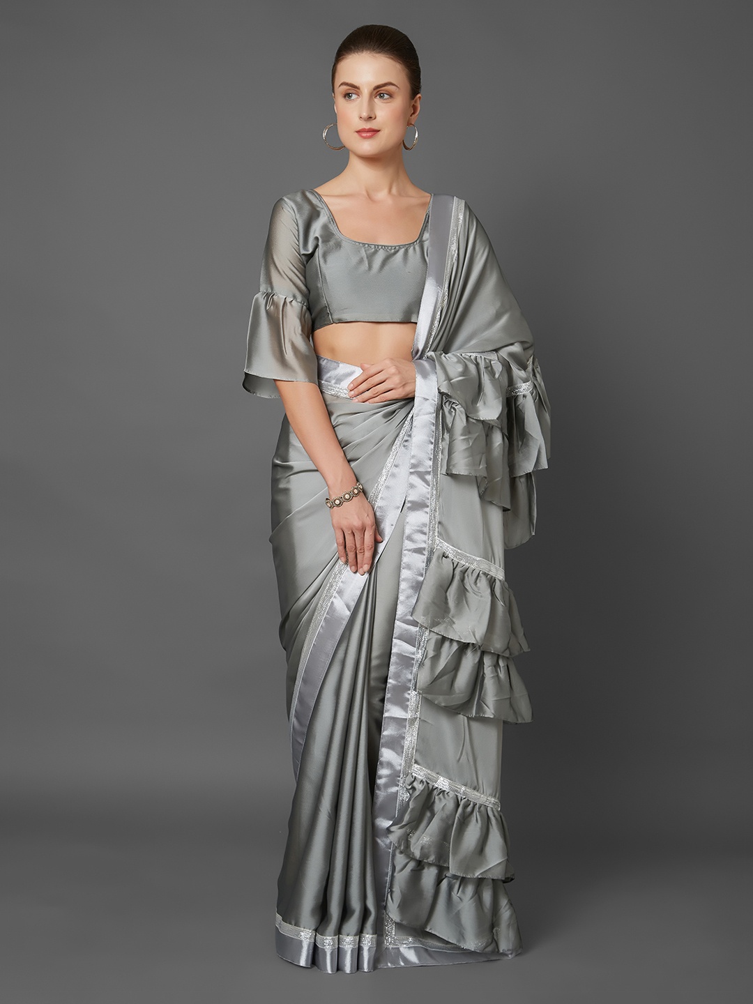 

Mitera Grey Solid Poly Georgette Saree