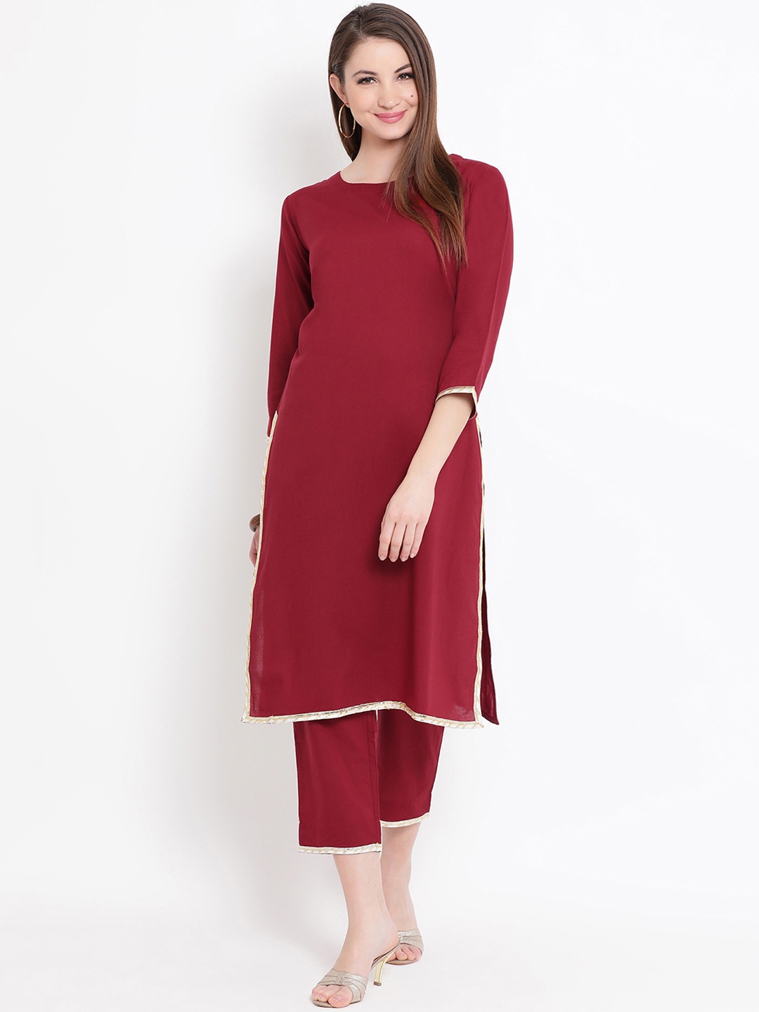 

FABNEST Women Maroon Solid Straight Kurta