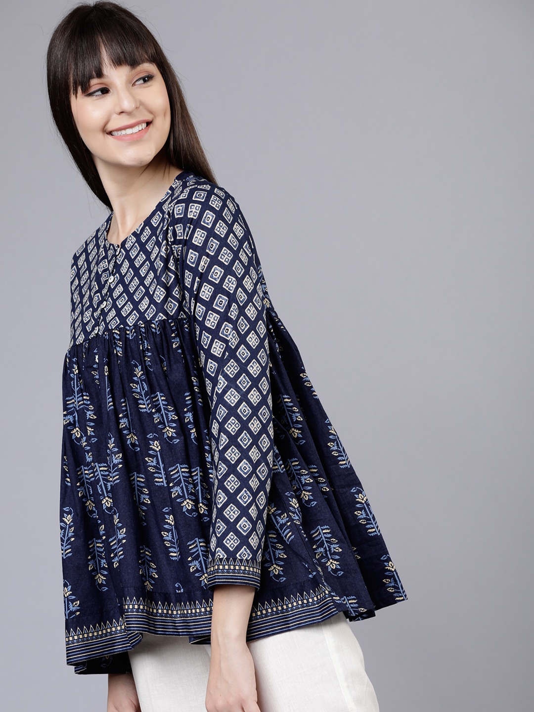 

Vishudh Women Navy Blue Printed Empire Tunic