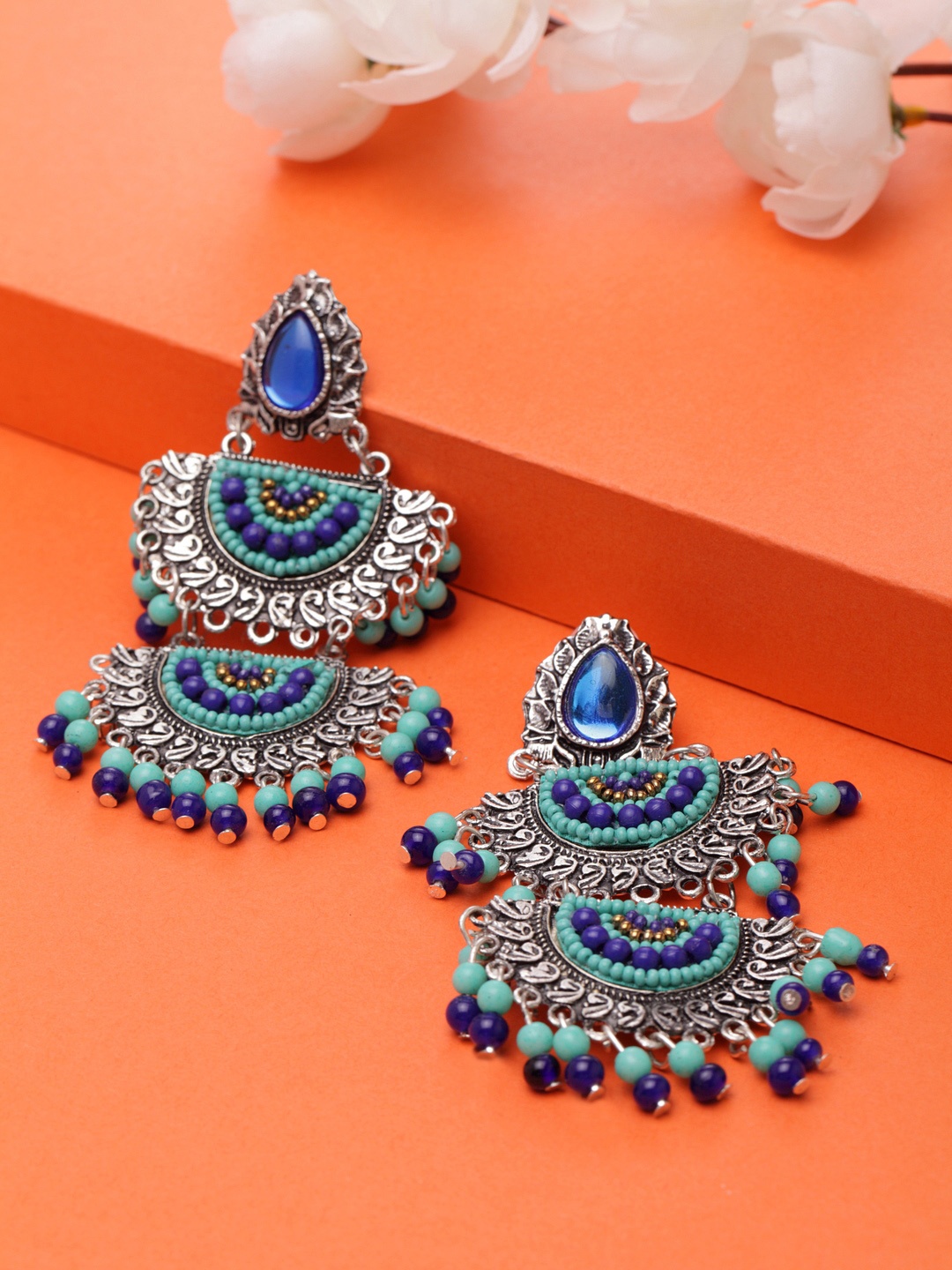 

Moedbuille Blue & Silver-Plated Handcrafted Afghan Oxidised Classic Drop Earrings, Turquoise blue