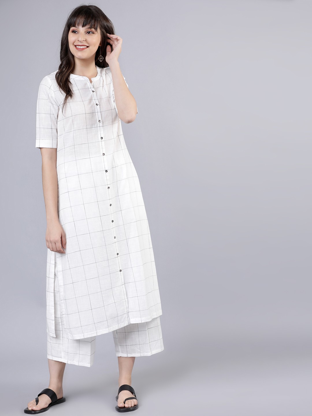 

Vishudh Women Off-White Printed Kurta with Palazzos
