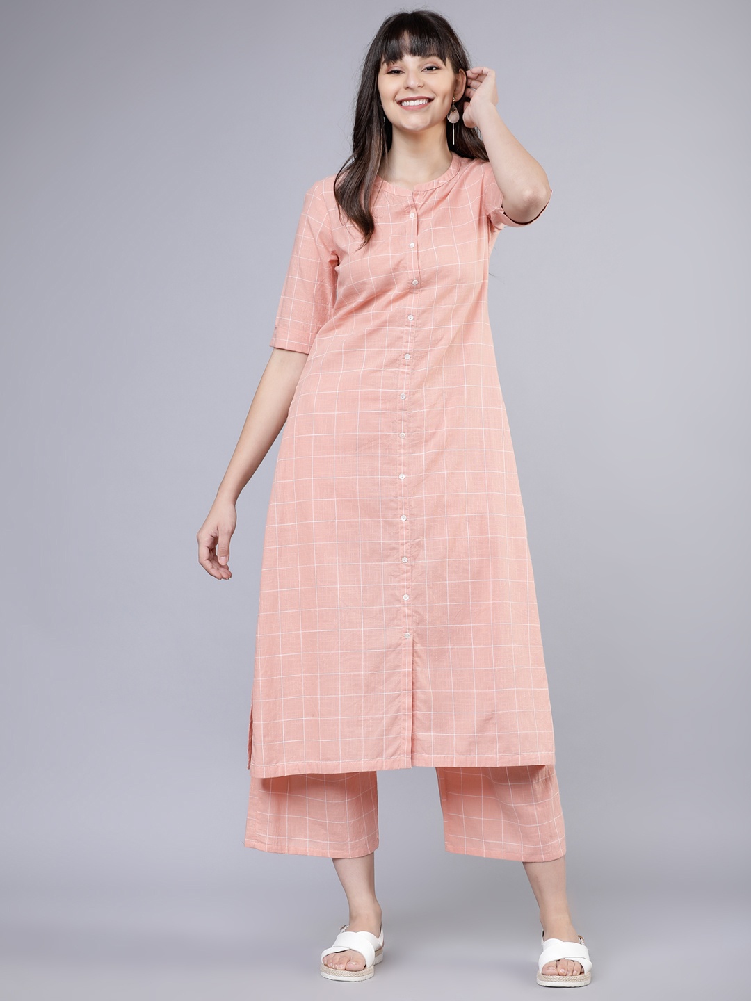 

Vishudh Women Orange Printed Kurta with Palazzos