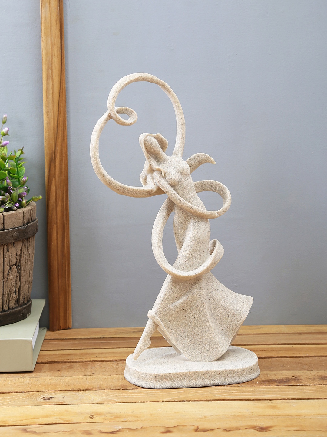 

TAYHAA Beige Feministic Women Figurine