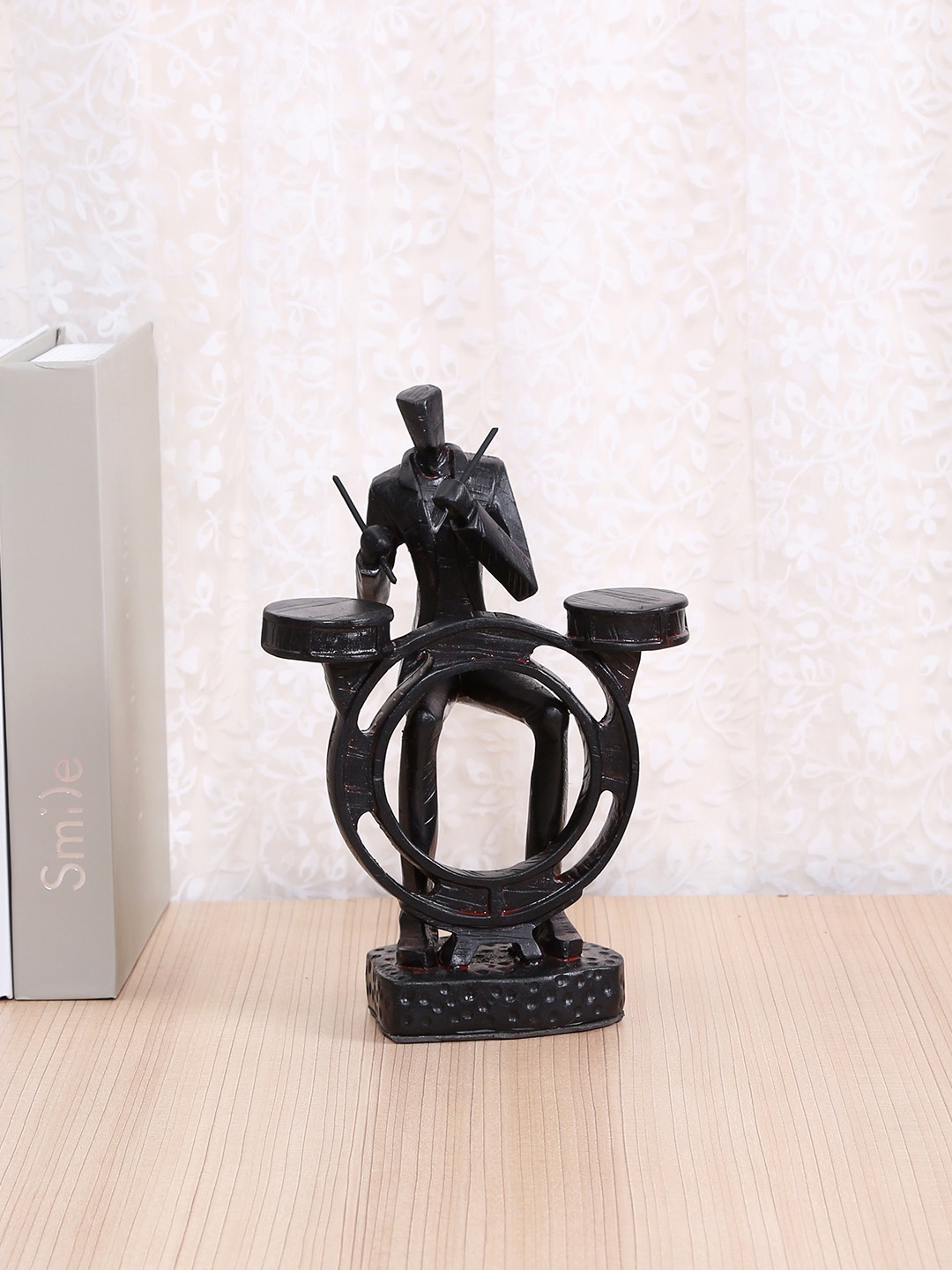

TAYHAA Black Sleek Man on the Drums Figurine