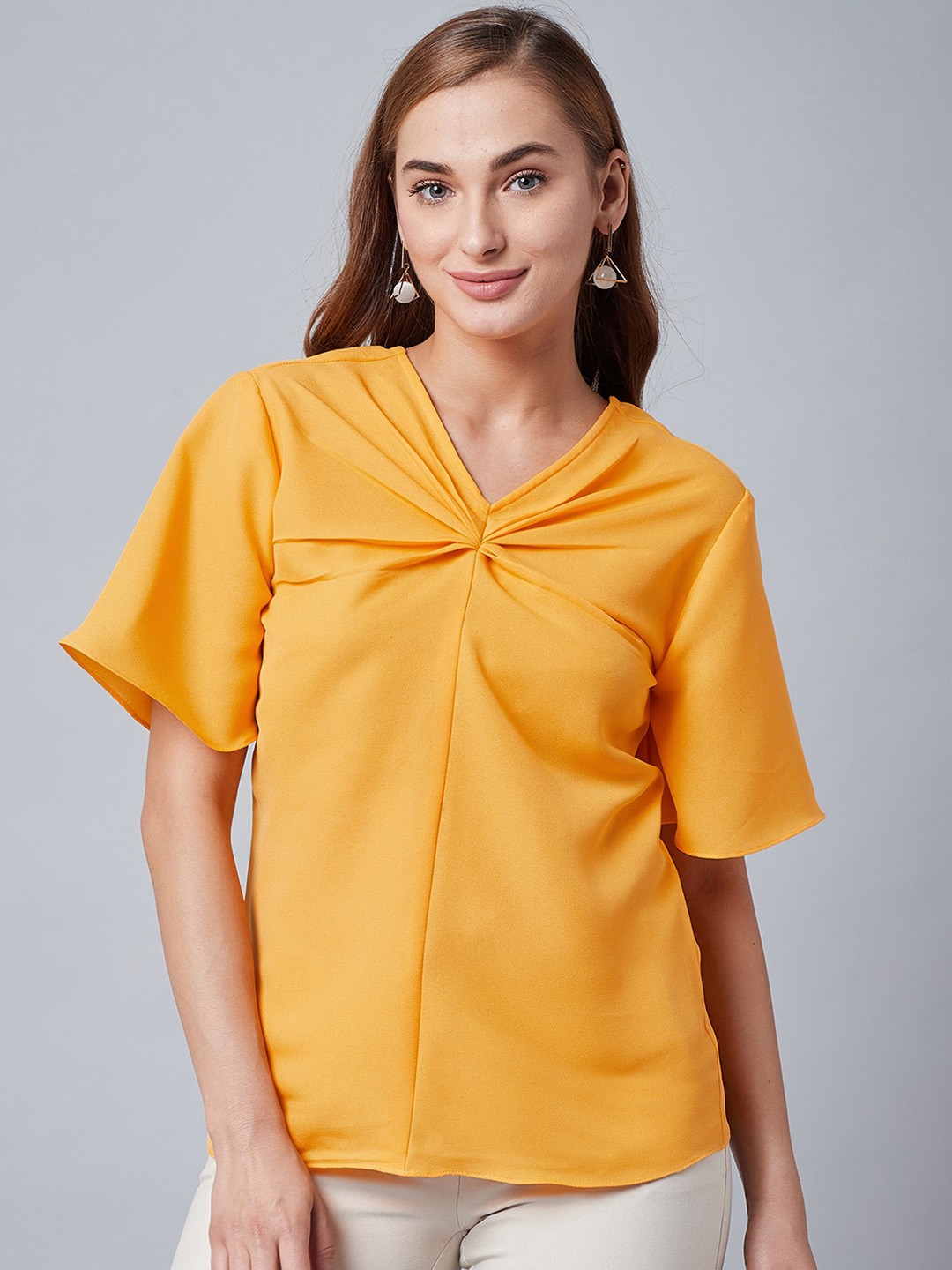 

Athena Women Yellow Solid Regular Top