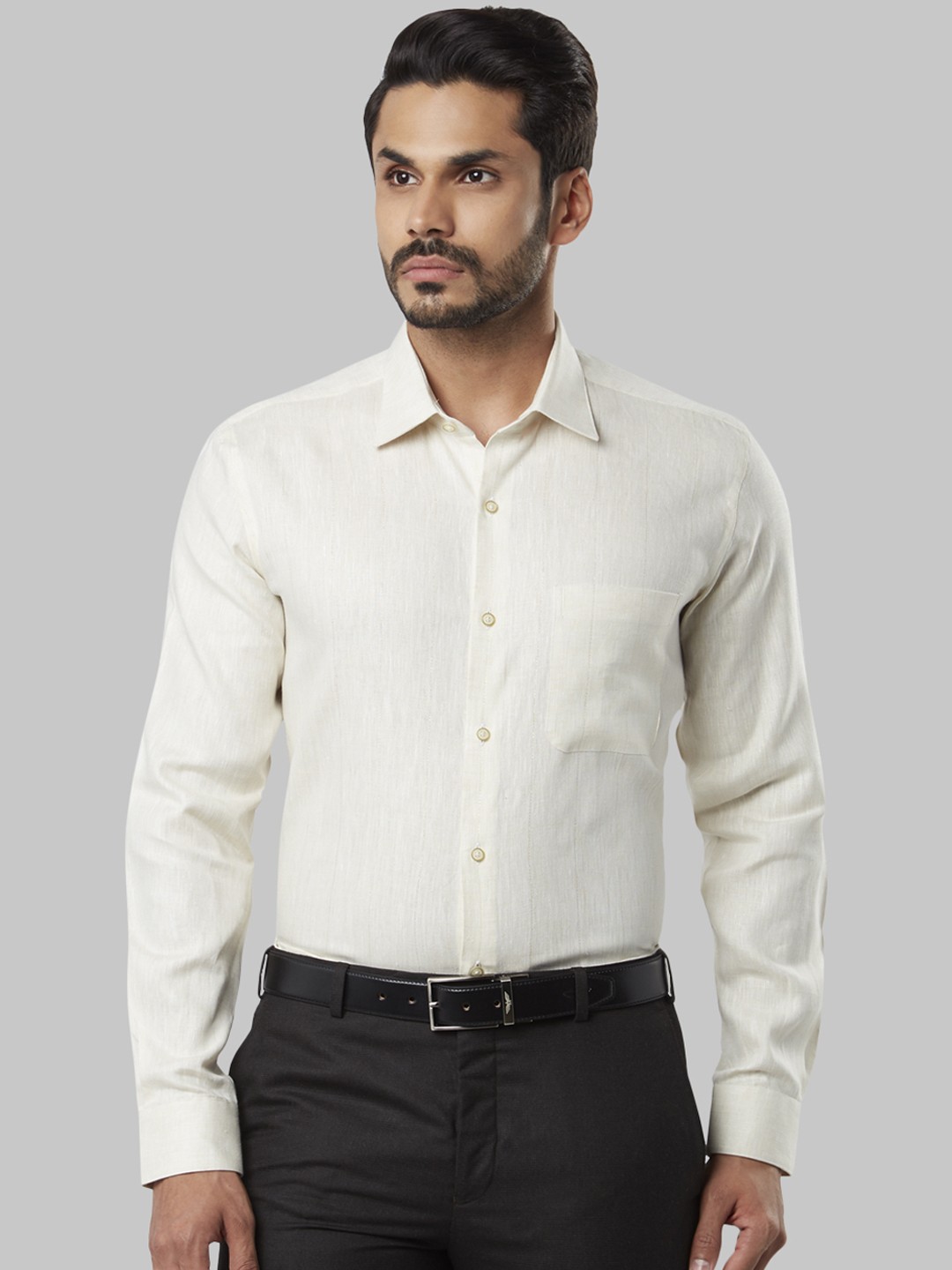 

Raymond Men Off-White Regular Fit Solid Formal Shirt