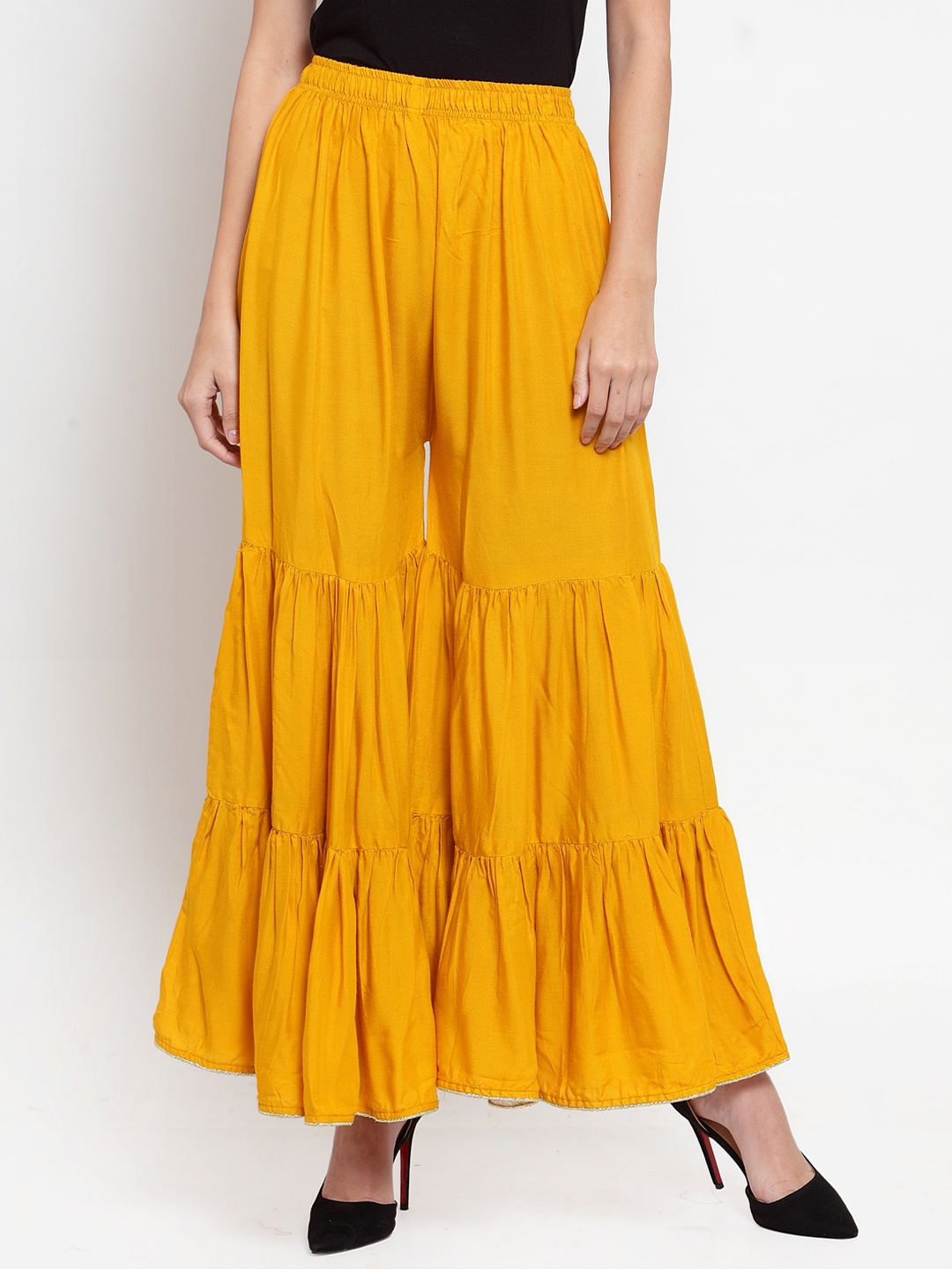 

Clora Creation Women Mustard Solid Flared Palazzos