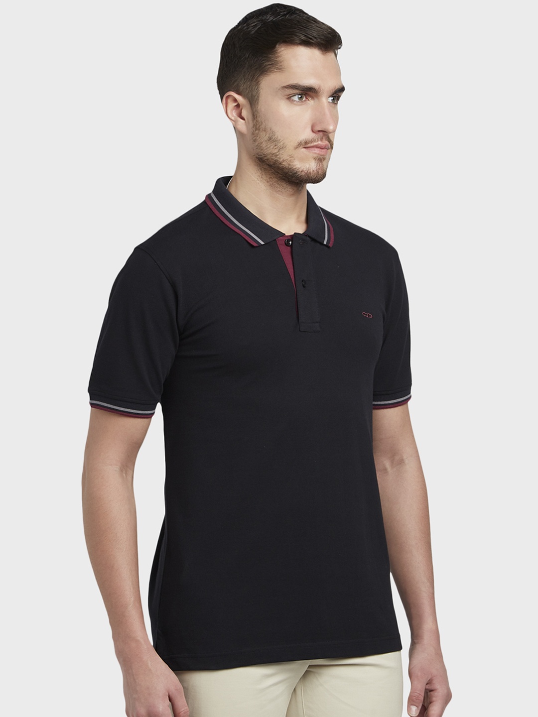 

ColorPlus Men Black Solid Polo Collar T-shirt